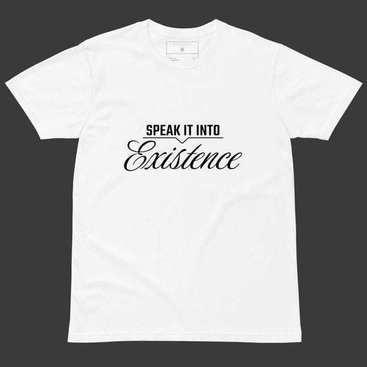 White tee with black text “Speak It Into” in bold caps above cursive “Existence” centered on the front.
